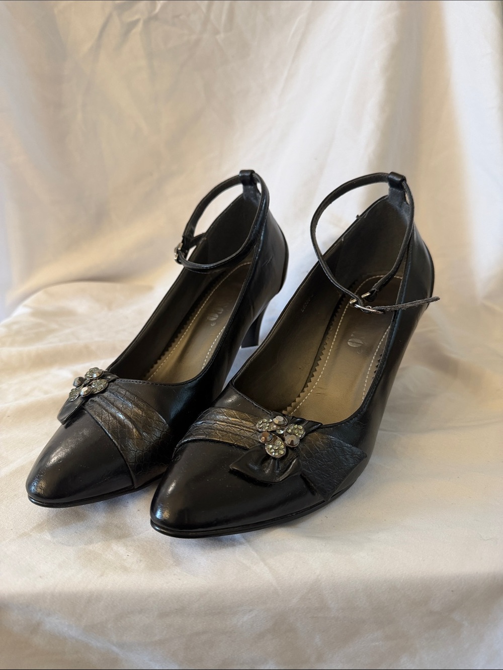 Black Ankle-Strap Pointed-Toe Heels with Crystal Flower Accent